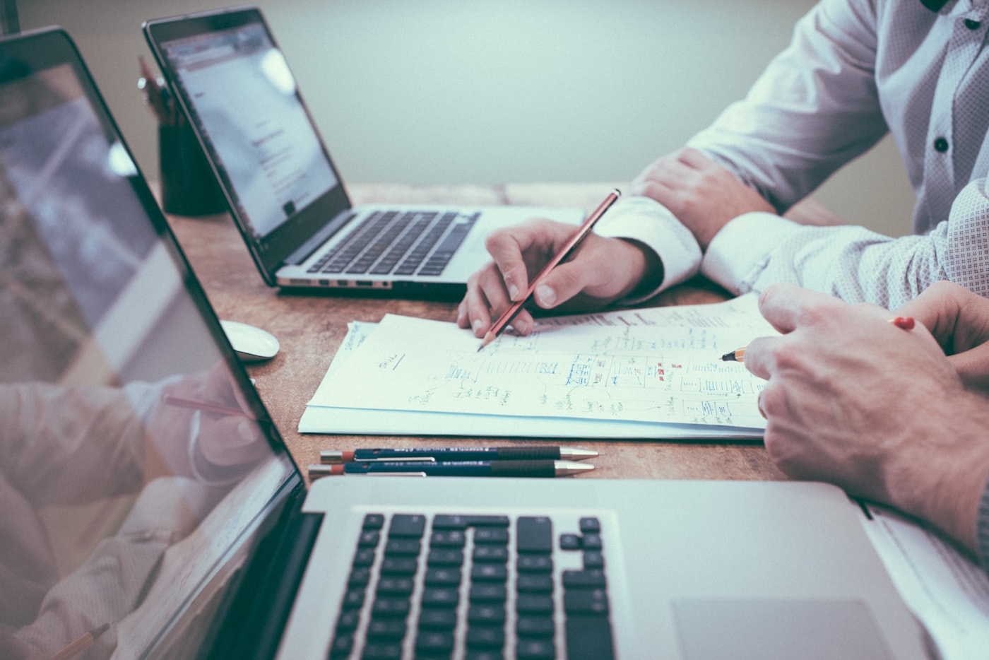 Professionals reviewing financial information at a table